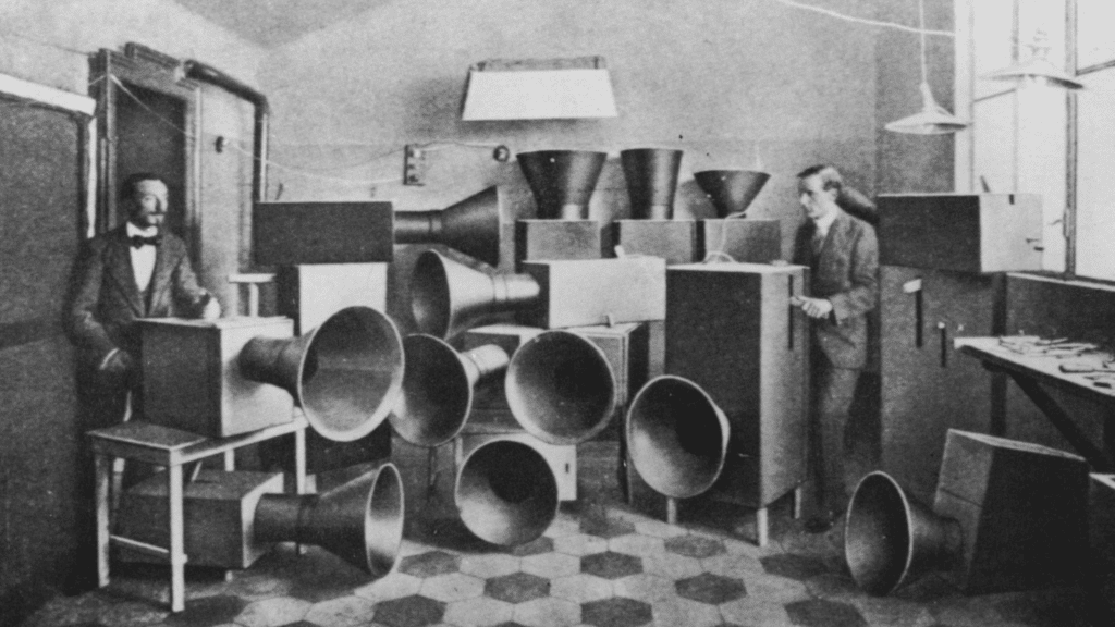 Italian Futurist musician, Luigi Russolo, with one of his noise machines intonarumori nosie machine